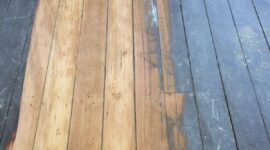 Partially stripped hardwood floor